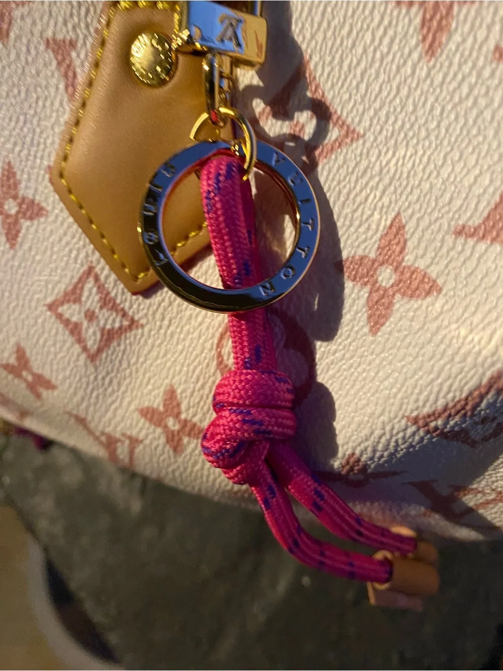 Not Authentic Louis Vuitton White and Pink Monogram Satchel with Gold Hardware